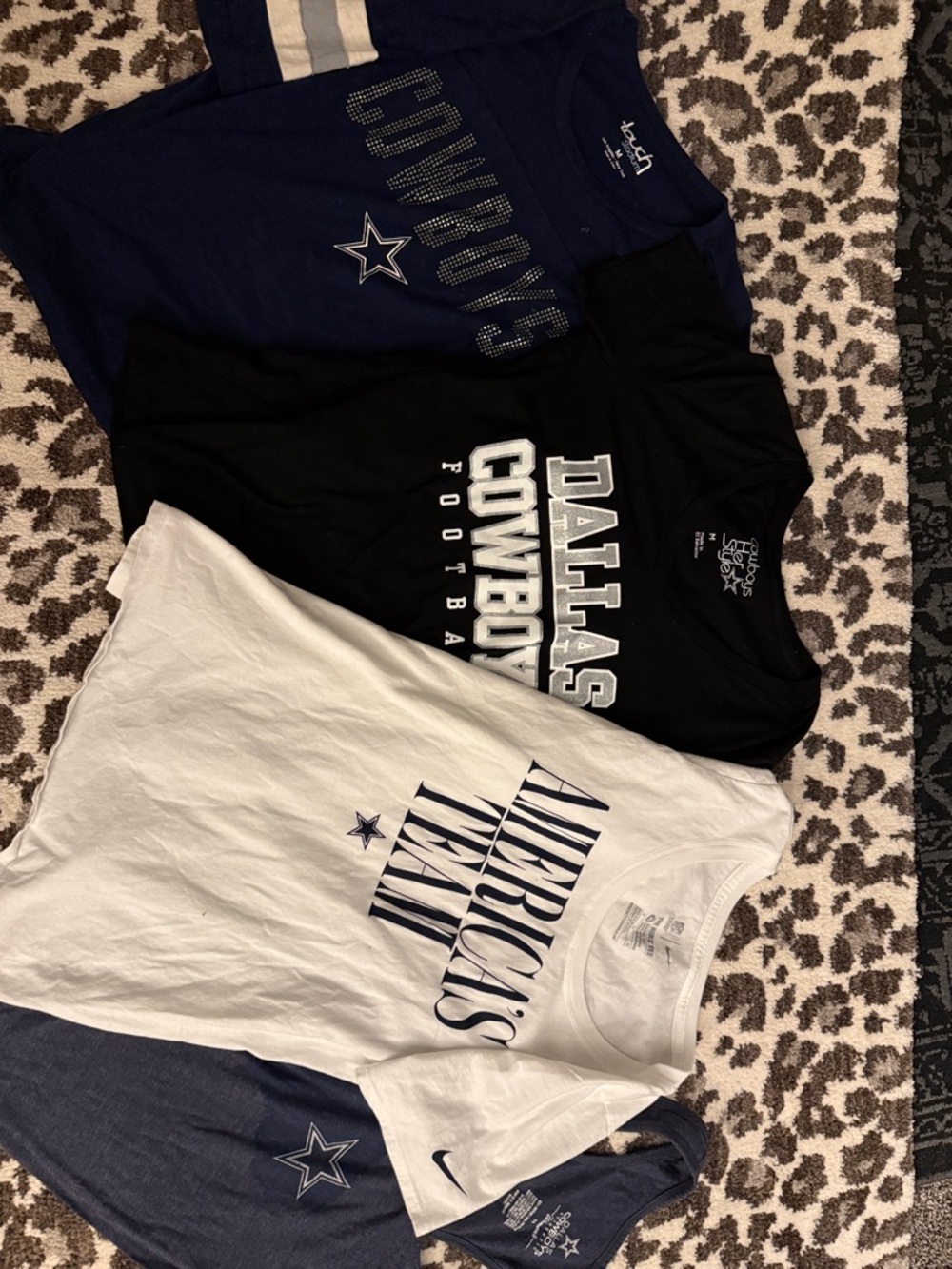 4 Dallas Cowboys women’s tops.